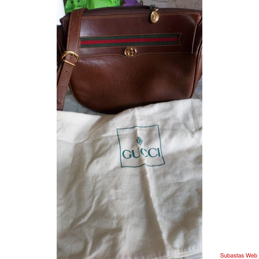 Vendo cartera Original Marca Gucci. Pongan el precio que les